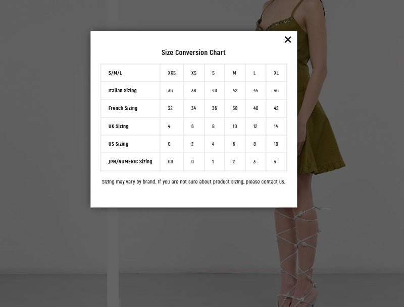 88% viscose, 11% nylon, 1% silk. Made in Colombia. Hand wash. Asymmetric open back. Midweight texturized knit fabric. Our Style No. PROE-WS162. Manufacturer Style No. R2437155.