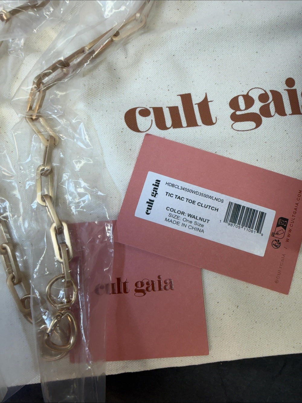 Cult Gaia Tic Tac Toe Clutch in Walnut wooden box purse